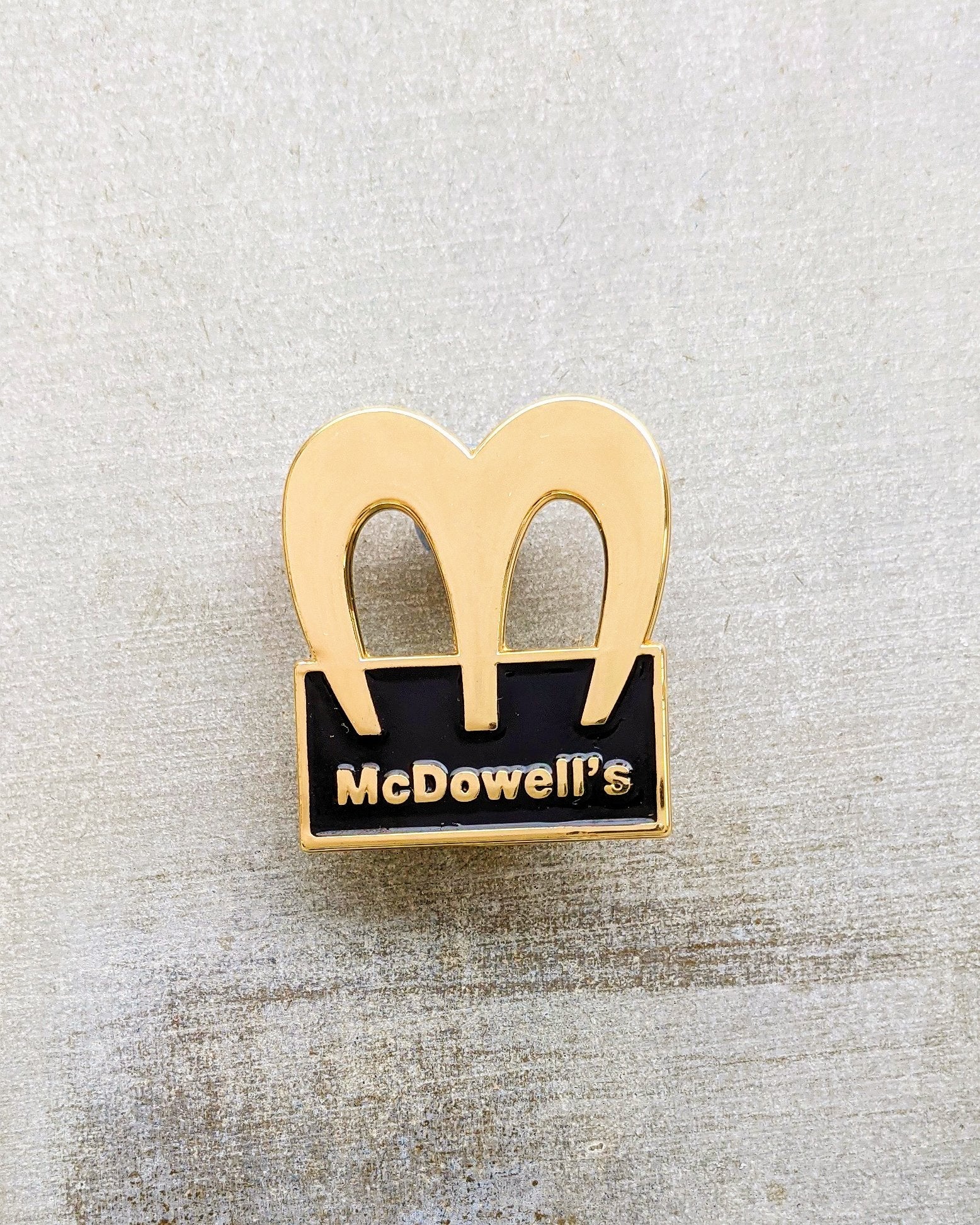 The Golden Arcs Pin